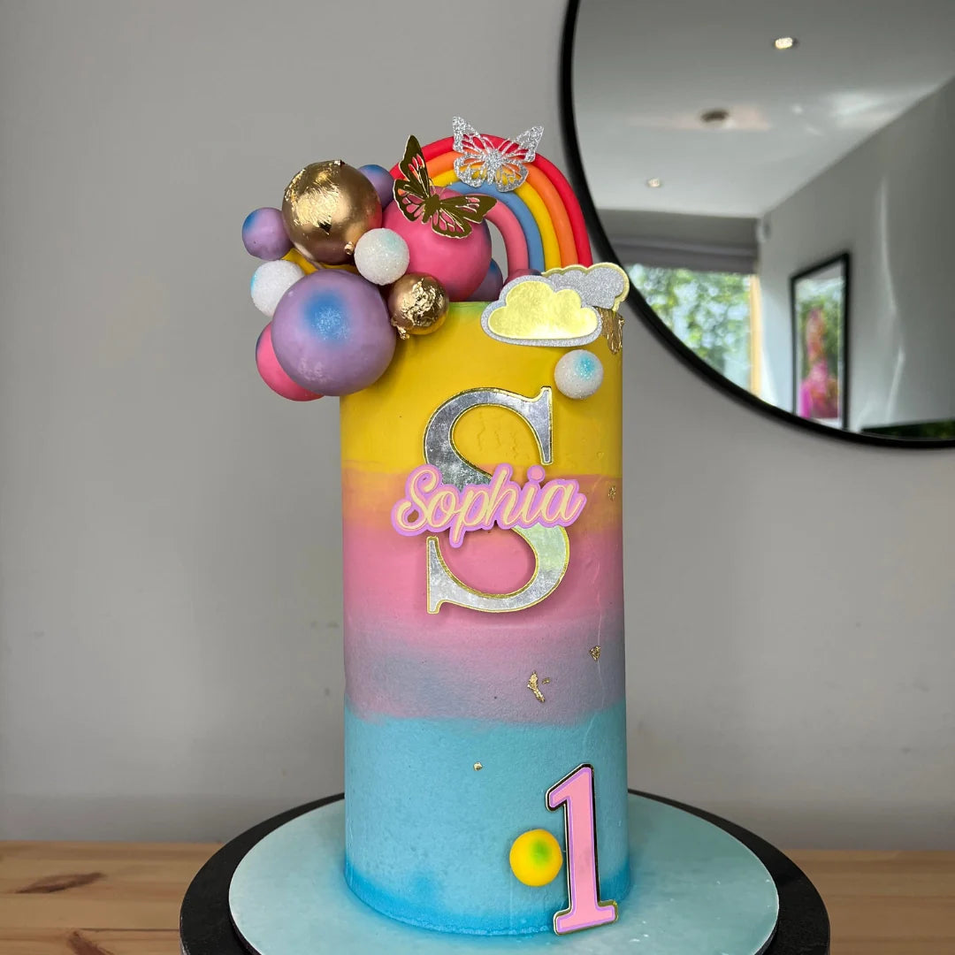 COLORFUL RAINBOW THEMED CAKE